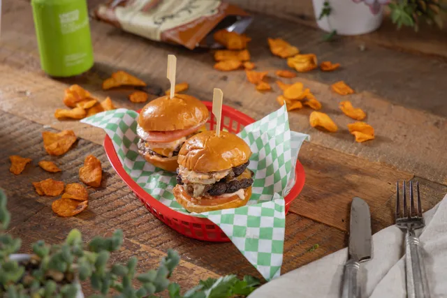 Scratch-made smashburger sliders on brioche at Deli Nerds in Costa Mesa